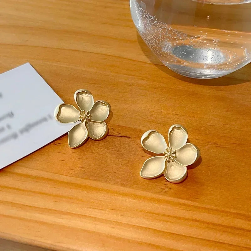 Gold flower earrings