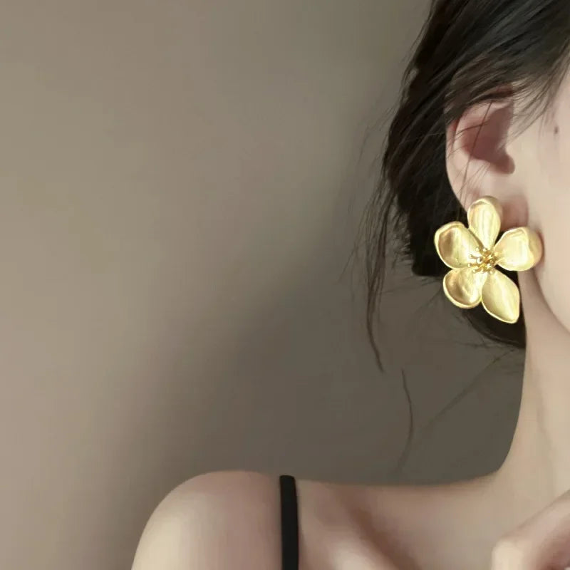 Gold flower earrings