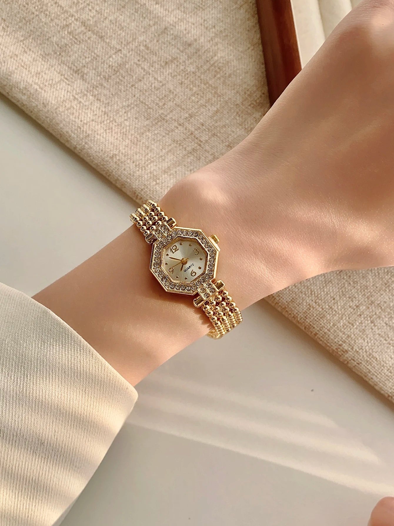 Golden elegant watch